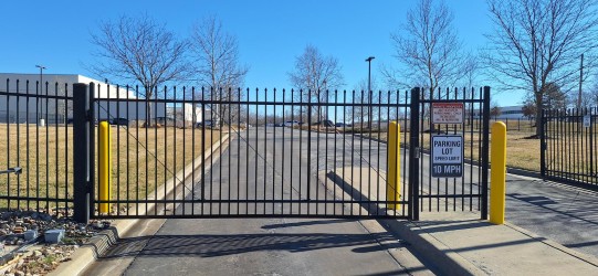 Ornamental iron gate installation